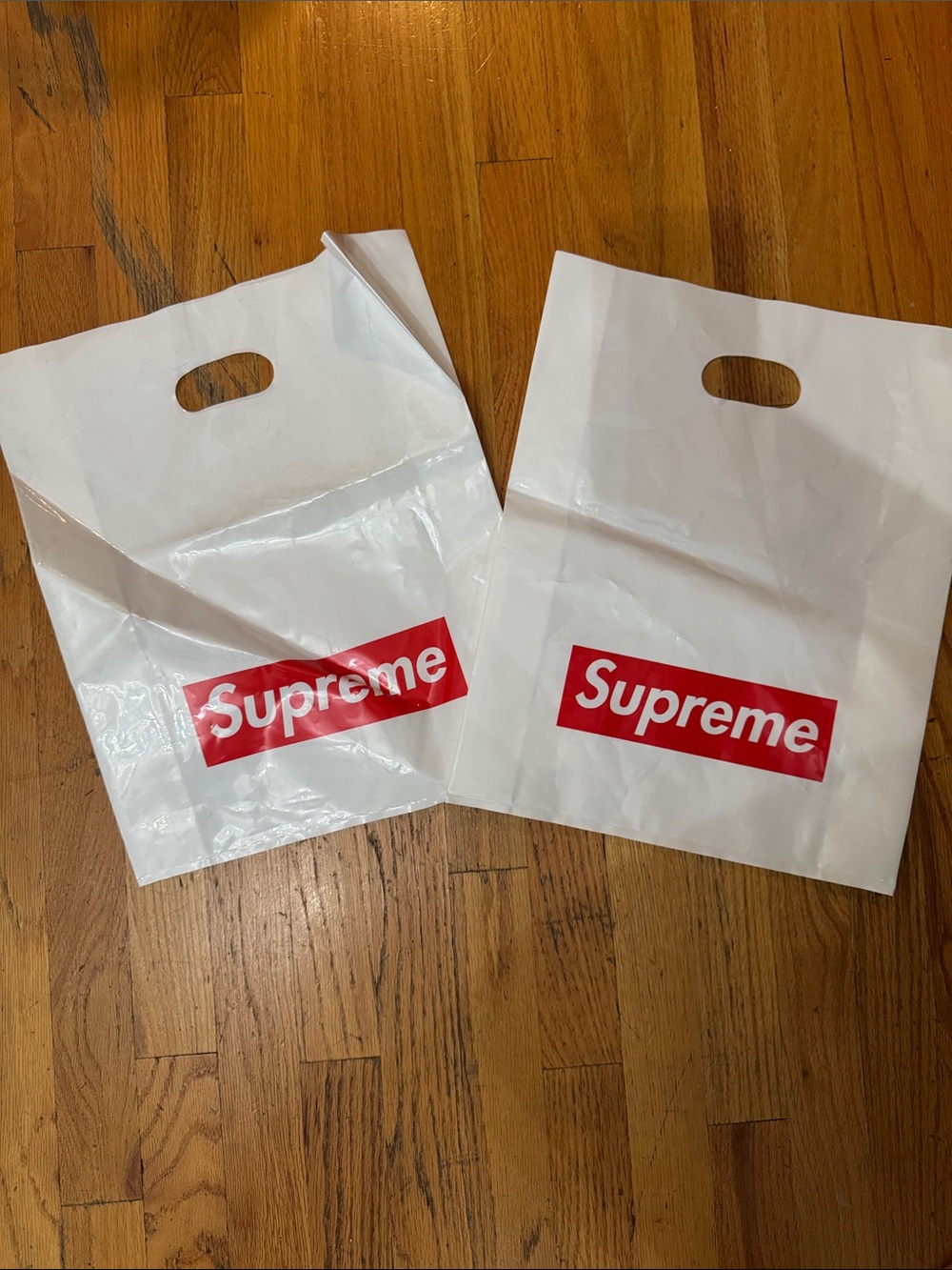 Supreme White Plastic Die-Cut Handle Bags with Red Logo (Pair)